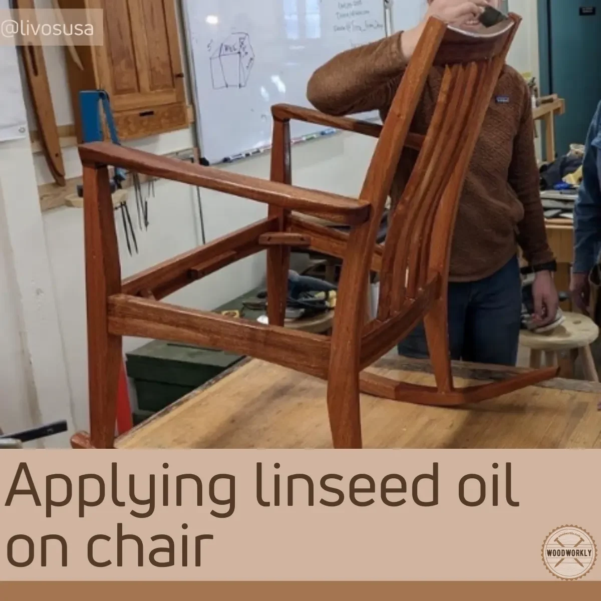 Applying linseed oil on chair