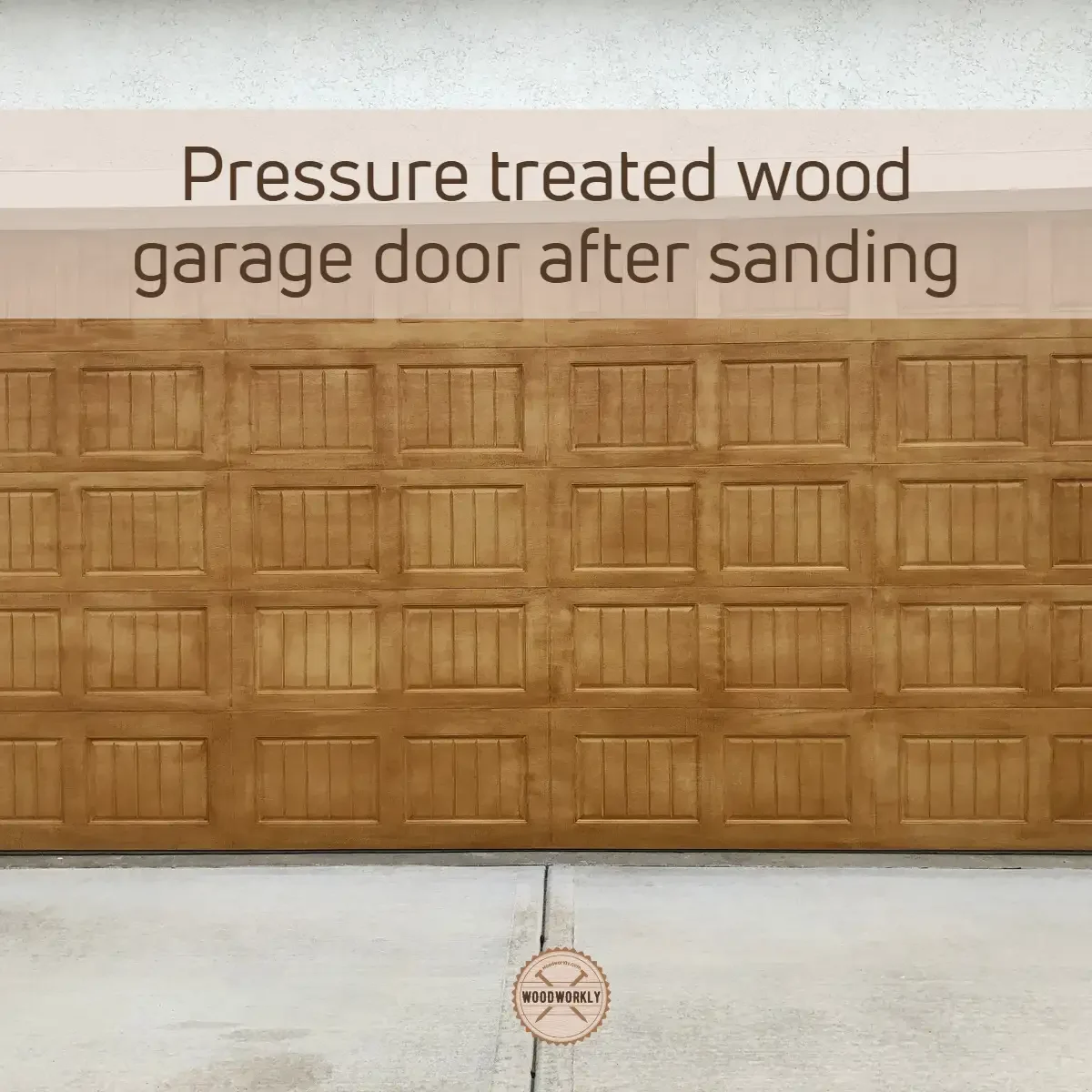 Pressure treated wood garage door after sanding